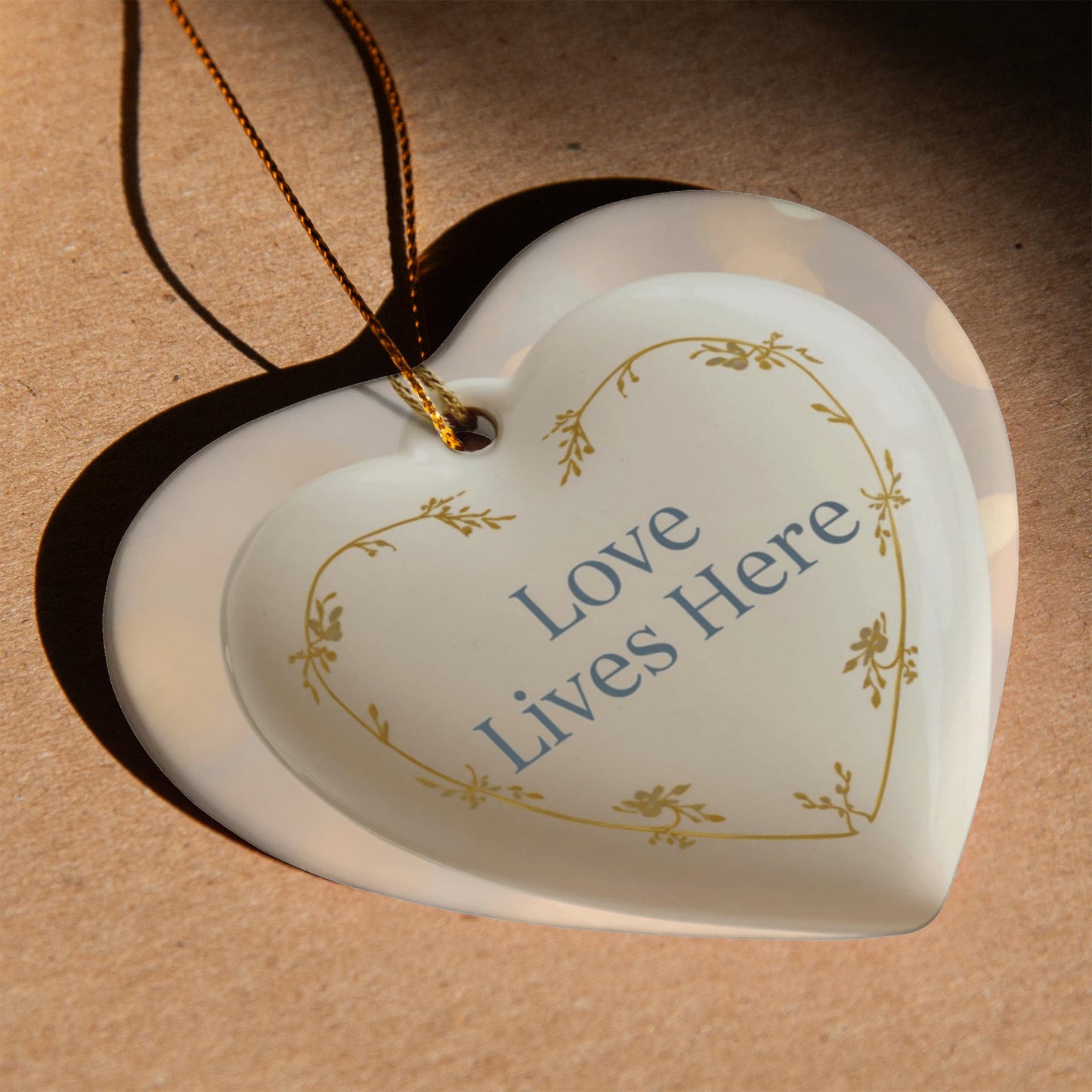 Ceramic Heart Ornament – “Love Lives Here”